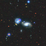 https://portal.nersc.gov/project/cosmo/data/sga/2020/html/169/PGC034553_GROUP/thumb2-PGC034553_GROUP-largegalaxy-grz-montage.png